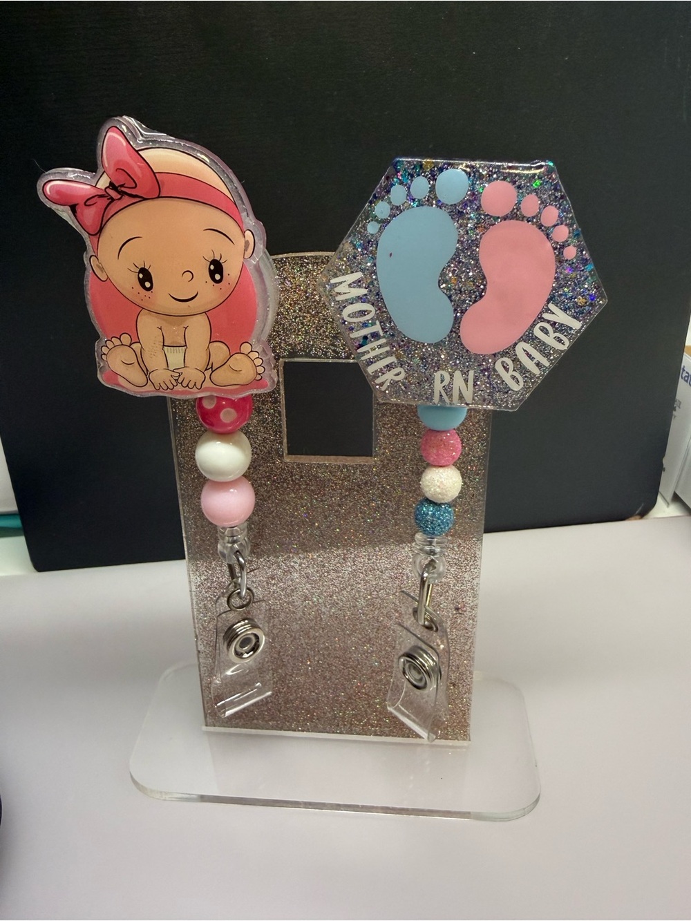 Badge reel mother baby RN and a baby girl